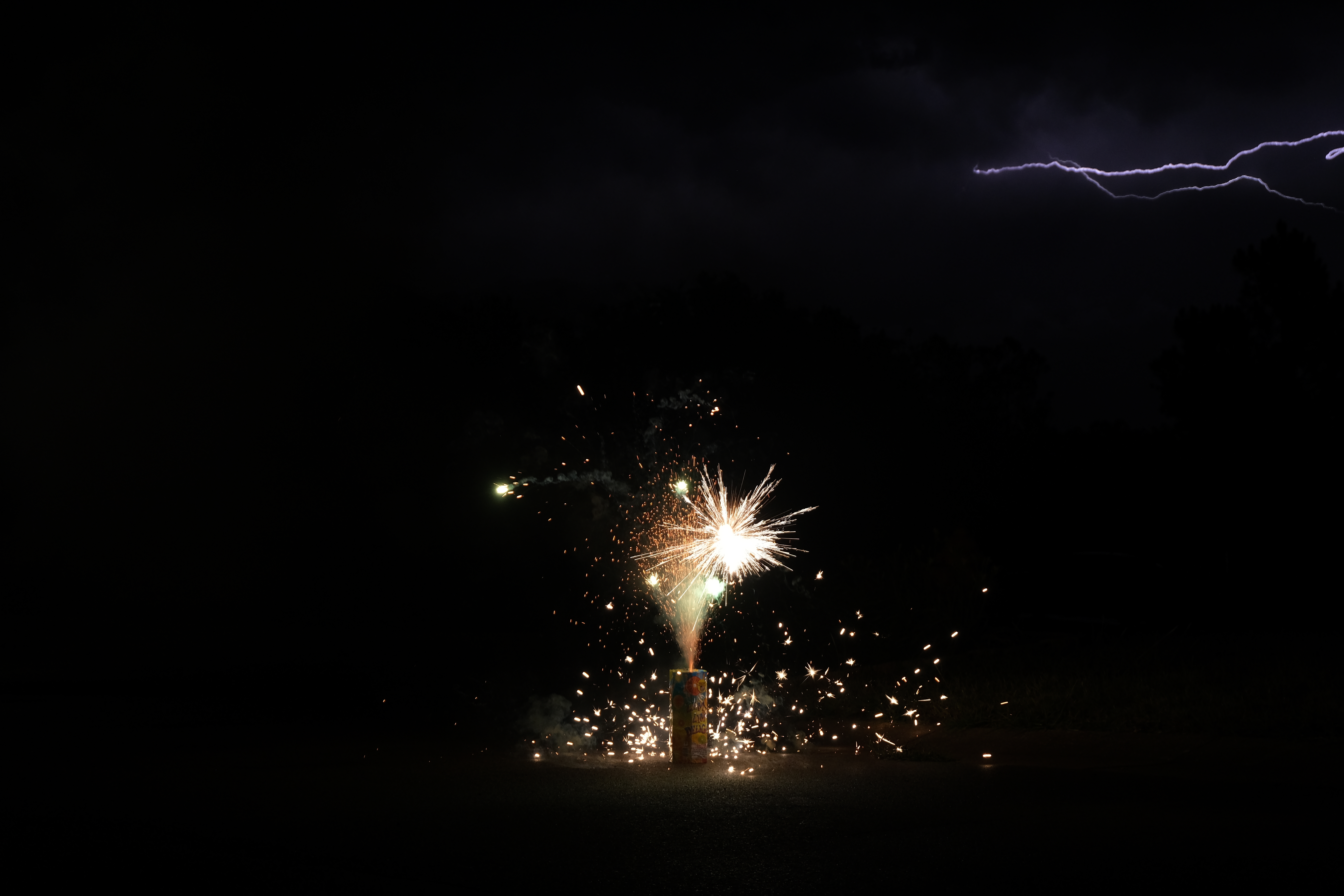 Firework with lighting in the background